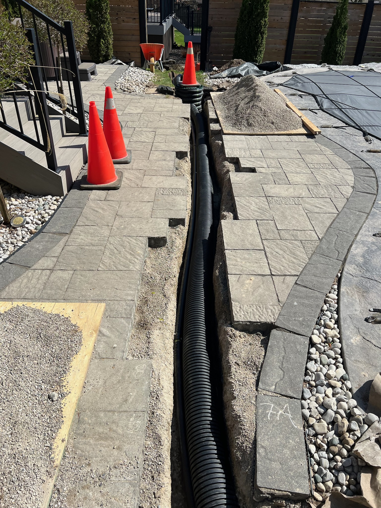 French drain solution under interlocking brick in London, Ontario French drain solution under interlocking brick in London, Ontario