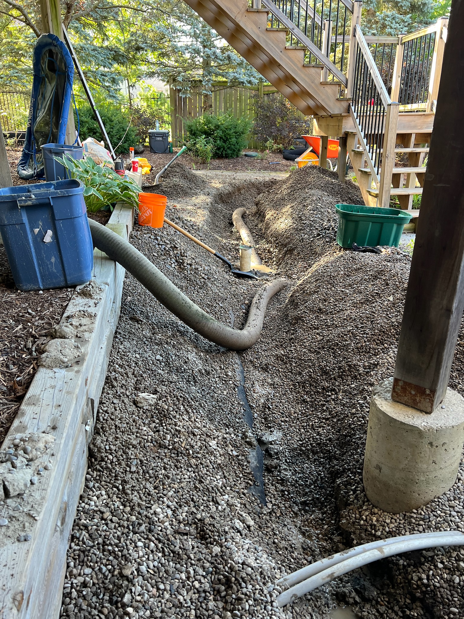 Outdoor drainage solution under deck in London, Ontario Outdoor drainage solution under deck in London, Ontario