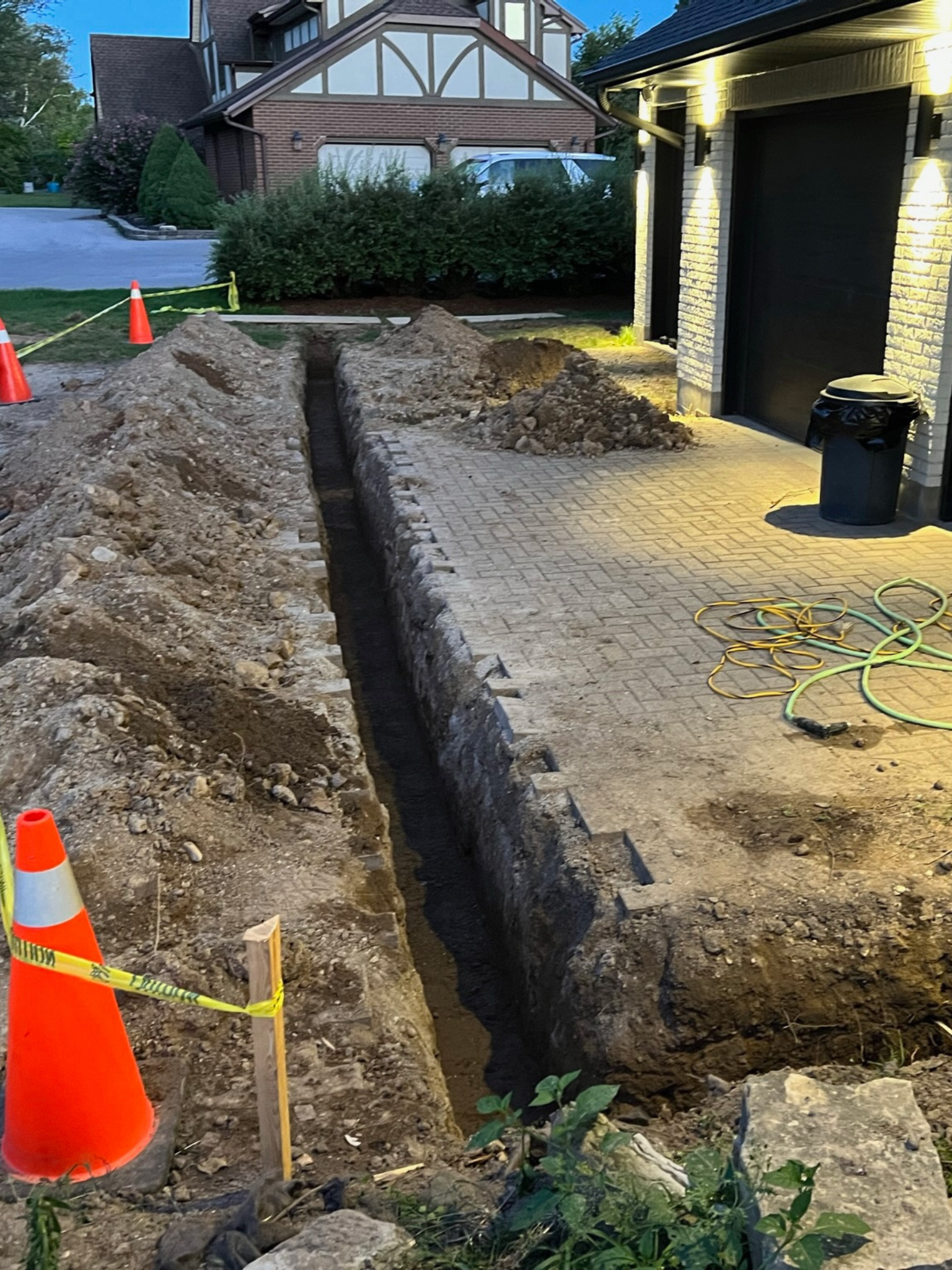 French drain solution under interlocking brick in London, Ontario French drain solution under interlocking brick in London, Ontario